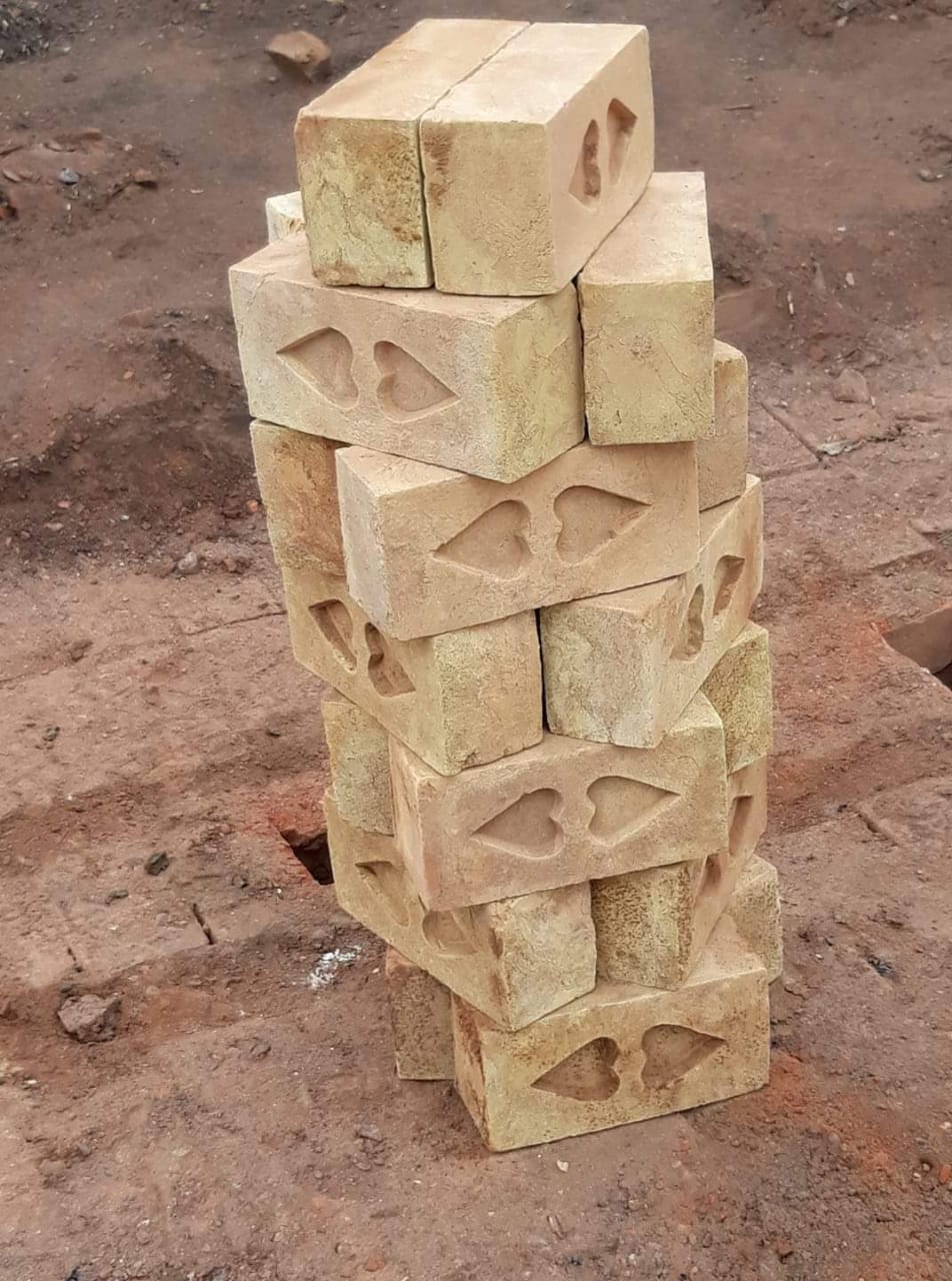 Decorative construction bricks with patterned openings